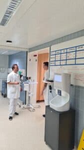 Smixin handwashing station available to staff in a hospital corridor