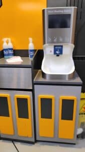 Smixin handwashing station installed at an indoor entertainment venue