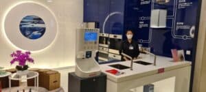 Smixin automatic handwashing system at a hospitality reception desk