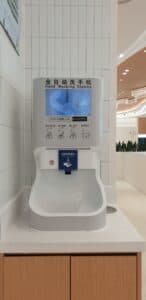 Smixin handwashing station installed beside a fast-food service counter