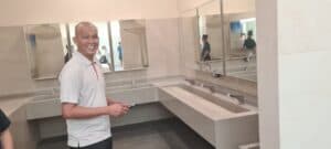 Smixin touch-free handwashing systems installed in a public washroom