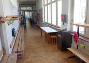 Smixin automatic handwashing station installed in a school classroom